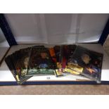 A quantity of Star trek and Stargate magazines.