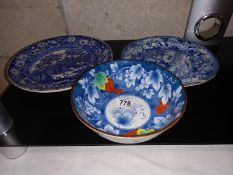 A Chinese blue & white bowl with red bunches of grapes & 2 19th/20th century blue Willow plates
