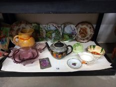 A shelf of miscellaneous including teapot, plates etc.,