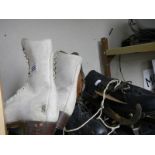 Two pairs of vintage ice skates.