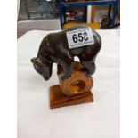 A Vintage brown bear on a log made in the USSR. Lonokovo "The Wheel" faience bear figurine stamped