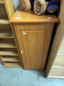 A teak effect CD cabinet and a varied selection of CD's including easy listening, COLLECT ONLY.