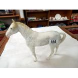 A Sylvac dappled white horse.