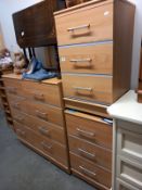 A light wood effect 8 drawer bedroom chest of drawers and 2 x 3 bedsides