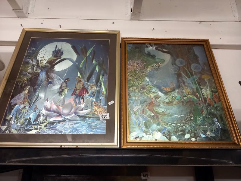 A pair of reflective (foil) pictures of fairies, 50 x 60cm and 45 x 55 cm.