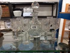 A cut glass decanter & 6 serry glasses