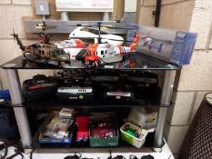 A quantity of radio control helicopters & accessories