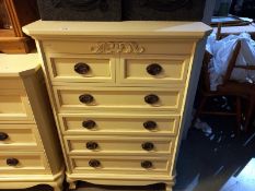 A good quality 2 over four white/cream chest of drawers