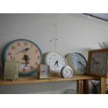 A selection of wall clocks.