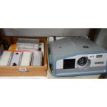 A slide projector and many 35mm slides.