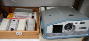 A slide projector and many 35mm slides.