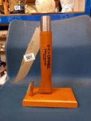 An unusual shop display penknife stand.