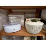 A steamer and a salad spinner.