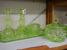 A green glass trinket set, complete.