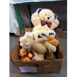 A box of soft toys including Winnie The Pooh, teddies etc