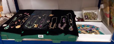 A good lot of costume jewellery including necklaces & matching earrings