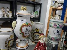 A quantity of ceramic apothecary jars.