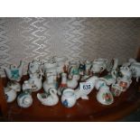 A mixed lot of crested china in good condition.
