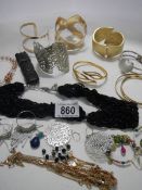 A mixed lot of bracelets and earrings etc.,