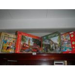 A quantity of vintage jigsaw puzzles.