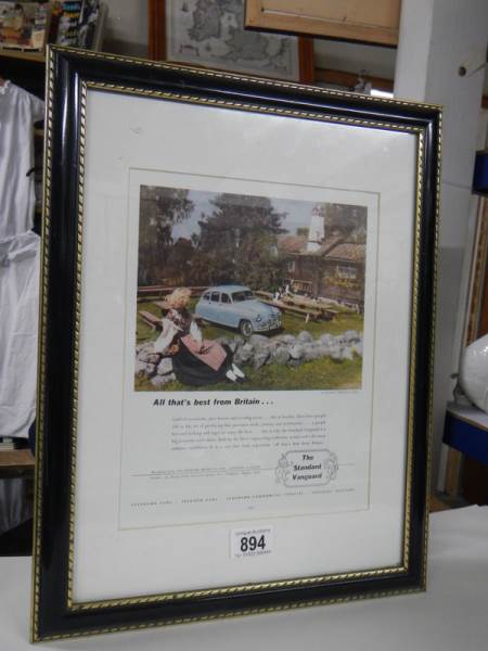 A framed and glazed Standard Vanguard poster.