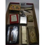 A quantity of cigarette lighters etc.,