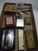 A quantity of cigarette lighters etc.,