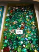 A tray of glass beads.