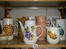 A mixed lot of ceramic coffee pots, jugs etc.