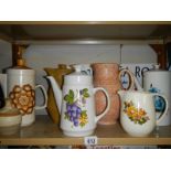 A mixed lot of ceramic coffee pots, jugs etc.