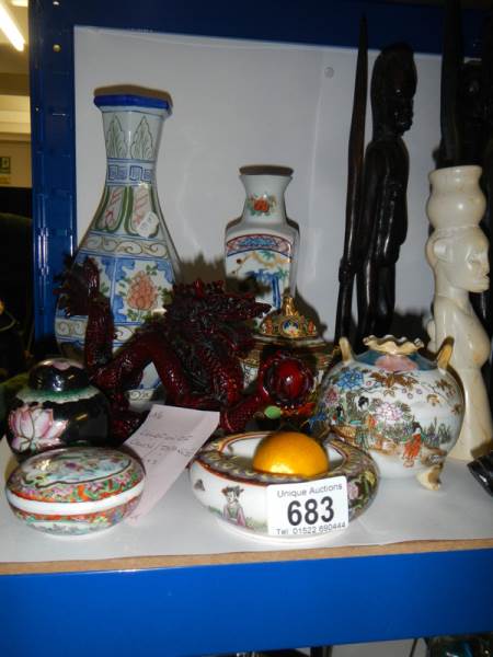 A mixed lot of 20th century oriental items including a dragon.