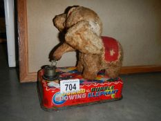 A mid 20th century battery operated elephant toy.