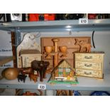 A mixed lot of wooden items including animals, miniature painted chest of drawers.