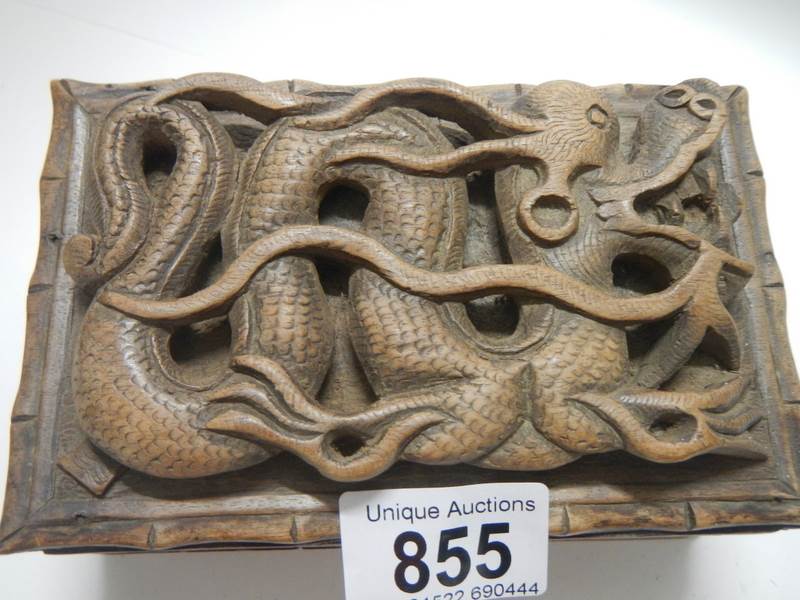 A carved box featuring a Chinese dragon. - Image 2 of 3