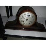 A Napoleon hat mantel clock, in working order.