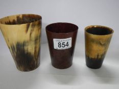 Two old horn beakers and one other.