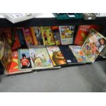 A quantity of children's annuals and books.