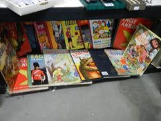 A quantity of children's annuals and books.