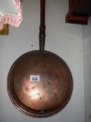 A Victorian copper warming pan. COLLECT ONLY.