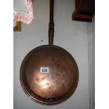 A Victorian copper warming pan. COLLECT ONLY.