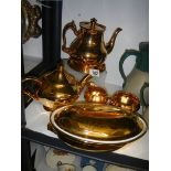 A Royal Winton Grimwades three piece tea set, another teapot and a tureen.