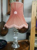 A late 20th century acrylic table lamp with early shade.