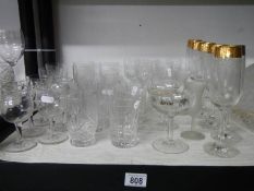 A mixed lot of drinking glasses.