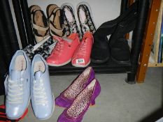 A mixed lot of ladies shoes.