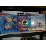 A quantity of jigsaw puzzles etc.,