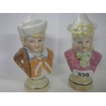 A pair of Staffordshire figures.