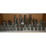 An oriental style heavy cast chess set.