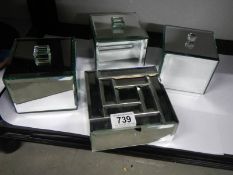 Four good mirrored jewellery boxes.