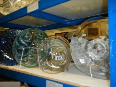 Four good coloured glass bowls etc.,