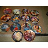 Fourteen Star Trek Collector's plates.